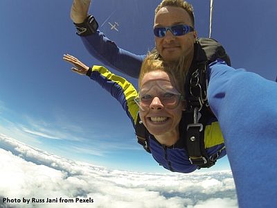 fisheye-photography-of-man-and-woman-sky-diving-739568.jpg